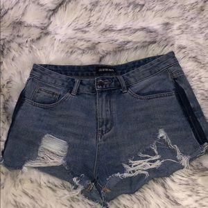Fashion Nova’s mid rise cut off shorts